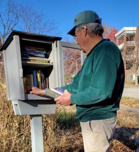 Photo of Don Arney at a little library